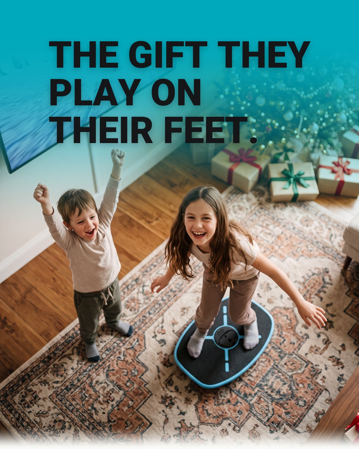 The gift they play on their feet. Kids playing GoBalance by the Christmas tree.