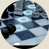 A coaching light glowing under one square of the board