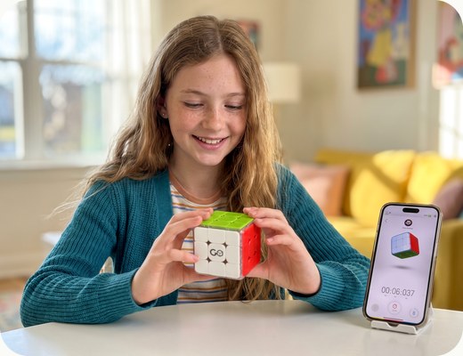 A girl solving GoCube with the app on her phone