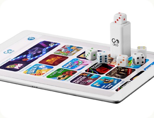 GoDice next to a tablet running a dice game