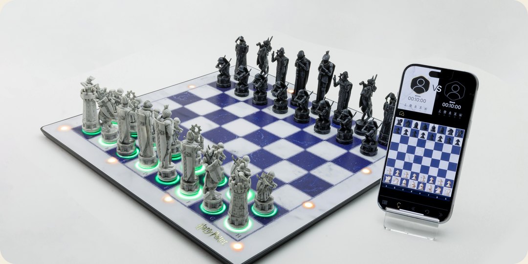 The GoChess Wizard board beside a phone running the GoChess app